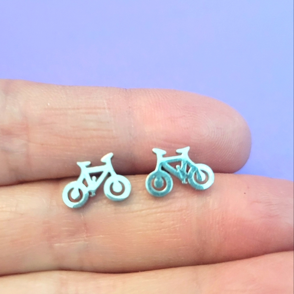 Set of small cute bicycle shaped stainless steel stud earrings with push backi…